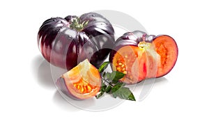 Black tomato, fresh ripe natural bio tomatoes close-up. Tasty organic Black Beauty tomato isolated on white