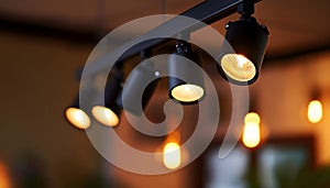 Black track lighting with five spotlights.