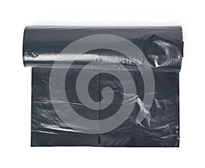 Black trash bag roll isolated