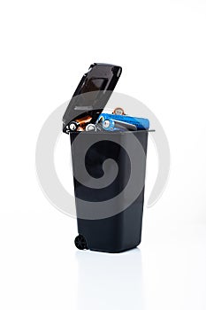 Black trash can on a white background. Trash can isolate.