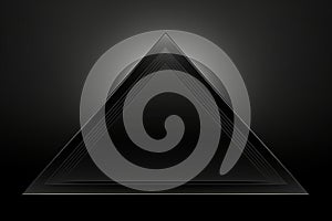 a black triangle on a dark background