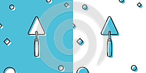 Black Trowel icon isolated on blue and white background. Random dynamic shapes. Vector Illustration