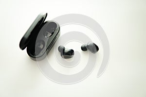 Black true wireless earbuds headphones with power bank case