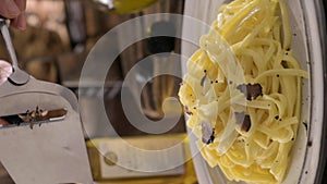 Black truffle on tagliatelle pasta. Expensive lunch, homemade pasta, traditional in the Lazo region of Italy.