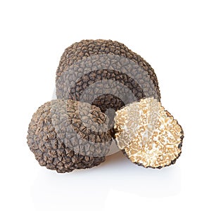 Black truffles and half on white