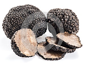 Black truffles isolated on a white background