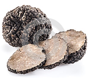 Black truffles on a white background. photo