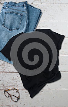 Black tshirt mockup with jeans styled product photo