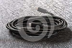 Black type C cable on dark background