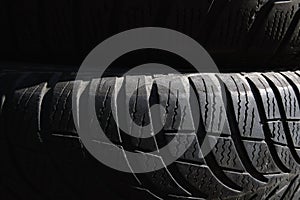 Black tyres background picture. Black texture, backdrop