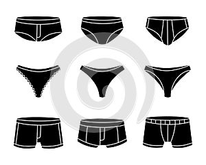 Black underpants. Woman and men underpants. Personal underclothing apparel. Classic boxers, trunks, bikini, strings photo