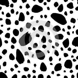 Black uneven specks, spots, blobs seamless pattern