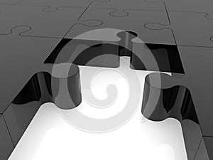 Black unfinished puzzle on a white