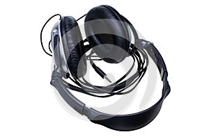 Black unplugged headphones isolated on white background