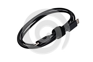 Black USB cable with plugs type A and type C at the edges on a white background