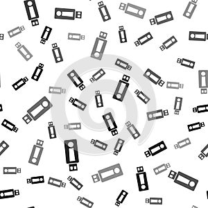 Black USB flash drive icon isolated seamless pattern on white background. Vector