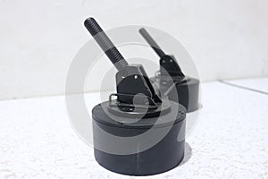Black vacuum suction cup for removing tiles from floor