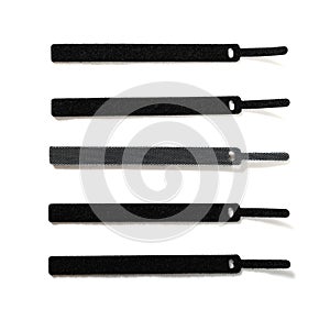 black velcro cable ties on a white background