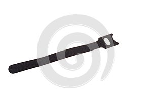 Black velcro fabric cable tie, isolated on white background