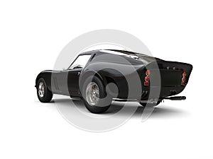 Black vintage race car - rear side view