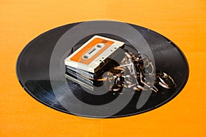 Black vinyl record on colored background photo