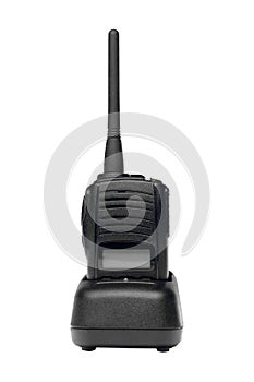 A black walkie talkie is sitting on a white background