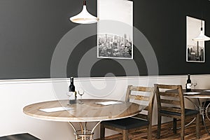 Black wall above wooden furniture in cafe
