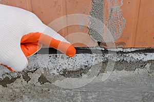 Black waterproofing membrane, layer which protects walls against moisture, capillary moisture