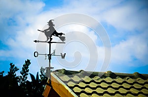 Black weathervane in the form of a witch