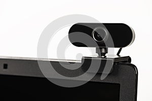 Black web camera on white background.