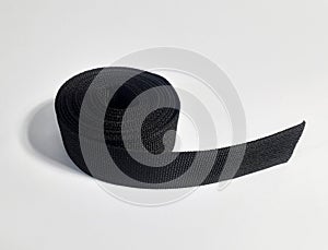 Black webbing strap with white background