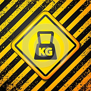 Black Weight icon isolated on yellow background. Kilogram weight block for weight lifting and scale. Mass symbol