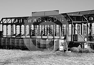 Black and White of Abandoned Horse Racing Gates