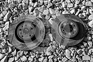 Black and white abandoned and rusted brake rotors