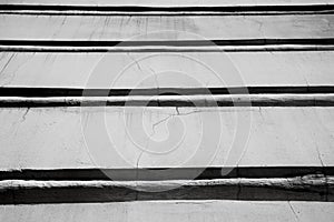 Black and white abstract background from horizontal lines of a building, photo