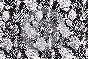 Black and white abstract camouflage. The concealment pattern on a fabric. photo