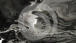 Black and white abstract liquid colors macro background