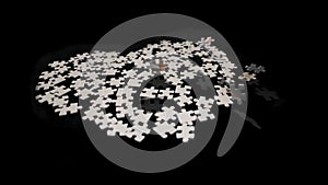 Black and white, abstract puzzles, on a black background. photo
