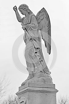 Black and white of Angel holding trumpet statue i