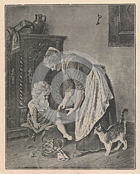 Black and white antique illustration shows a mother putting girl& x27;s socks on her legs. Vintage marvellous