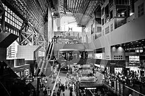 Black and white architectural view of the interior of the modern Kyoto railway station..Kyoto / Japan - August 2nd 2017