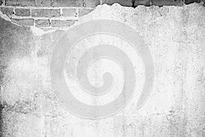Black and white background concept, Old white masonry is cracking and decaying. The abstract white interior of an old broken brick