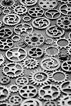 Black and white background with metal gears.