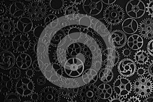 Black and white background with metal gears.