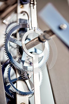 Black white background with metal gears in oil. Macro. Conceptual photo for your successful business design. Teamwork