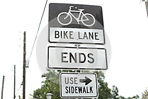 Black and white bike lane sign