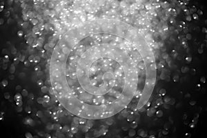 Black and white bokeh circles as a design element, overlay or backlight