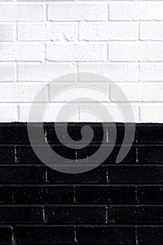 Black and white brick wall background.