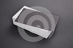 Black and white business cards on black background. 3d rendering