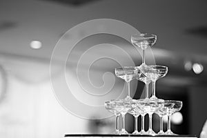 Black and white Champagne glass pyramid.pyramid of glasses of wine,